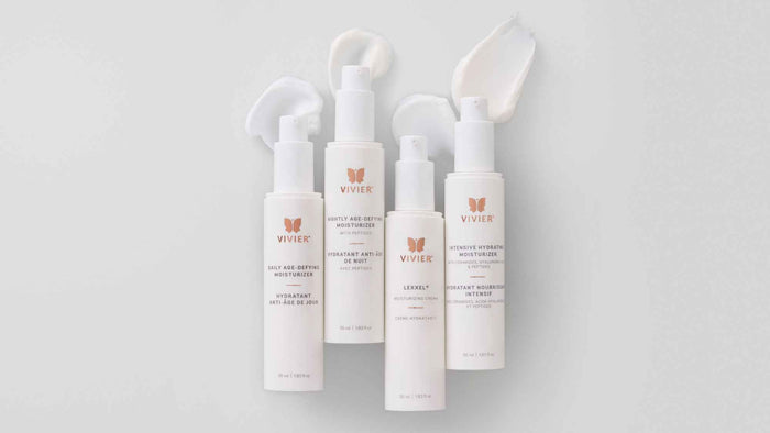 Four Vivier moisturizers displayed on a white background with swatches of cream showcasing their rich textures.